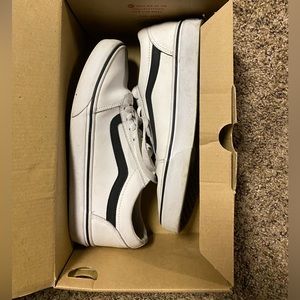 white and black leather vans
